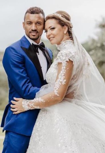 Daniela with her husband on their wedding day